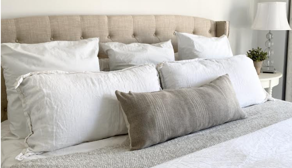 how-to-style-neutral-pillows-for-a-queen-bed-inside